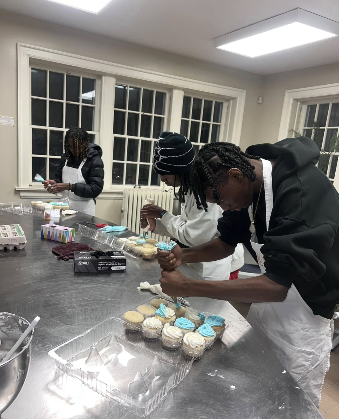Syracuse baker presenting a towering wedding cake design