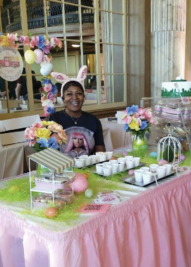 Baker presenting freshly baked bread loaves to guests